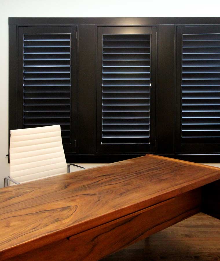 black shutters in home office