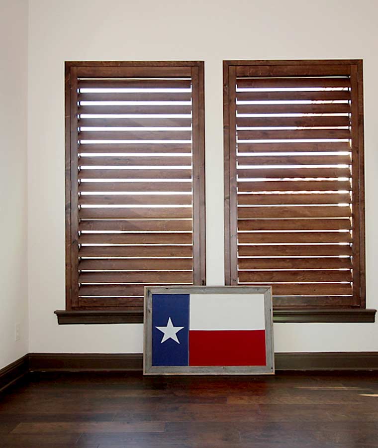 knotty alder shutters with texas flag